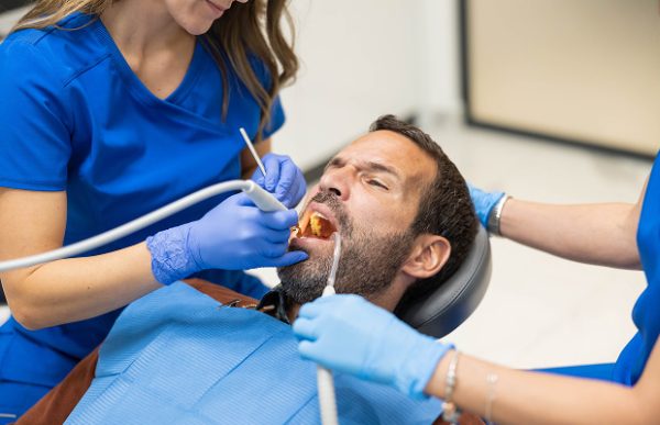 Deep cleaning removes tartar and bacteria below the gumline to treat gum disease